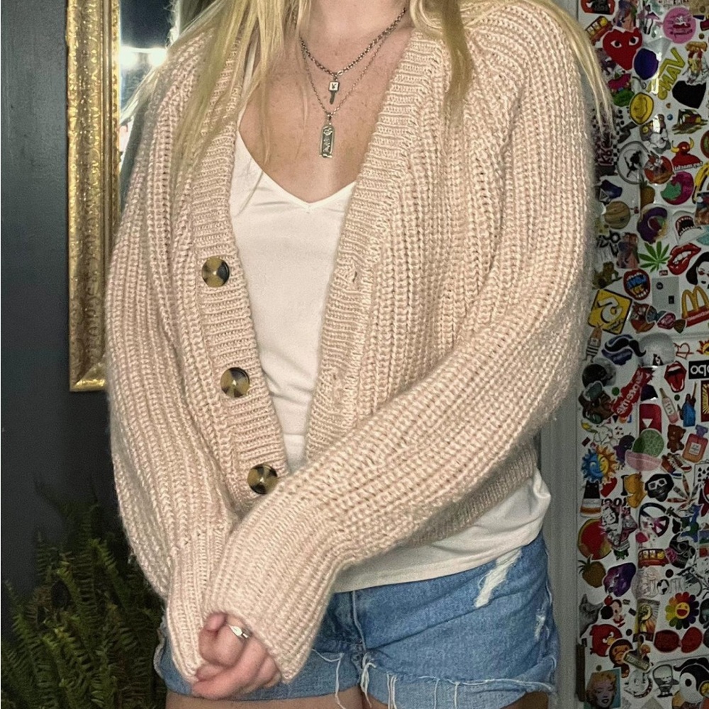 light pink thick button up knit sweater